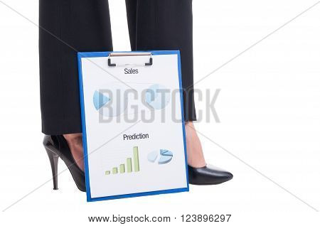 Sexy Business Woman Feet And Financial Reports With Charts