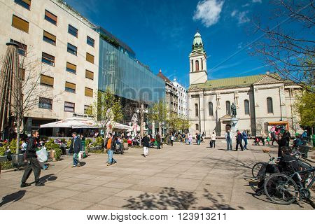 Zagreb, Croatia-March 31th, 2016: Preradovic square (Flower square), and Serbian orthodox church in Zagreb, capital of Croatia. Prominent tourist location in Zagreb with cafes, bars and restaurants.