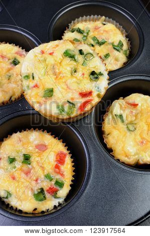 Baked vegetable casserole portion ham with cheese