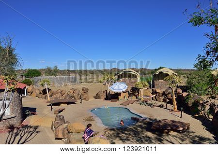 KEETMANSHOOP NAMIBIA - JAN 25 2016: Swimming pool in Quivertree Forest Rest Camp where visitors can explore the ancient and famous Quivertree Forest
