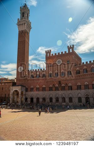 Panorama of Siena, Tuscany, Italy. Piazza del Campo with Palazzo Pubblico and its Torre del Mangia. Beautiful image of medieval italian town.