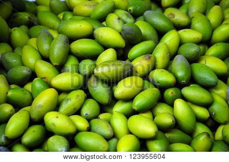 Fresh green olives for sale in Zhaojialou Town in Shanghai China.
