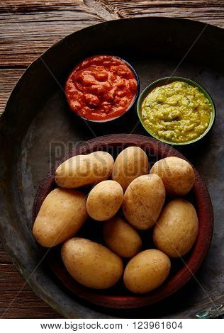 Papas arrugas al mojo Canary islands wrinkled potatoes with green and red sauces