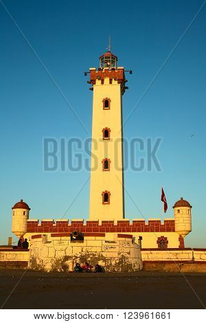LA SERENA, CHILE - APRIL 8, 2015: The lighthouse of La Serena, a national monument since 2010, lit by the setting sun on April 8, 2015 in La Serena, Chile