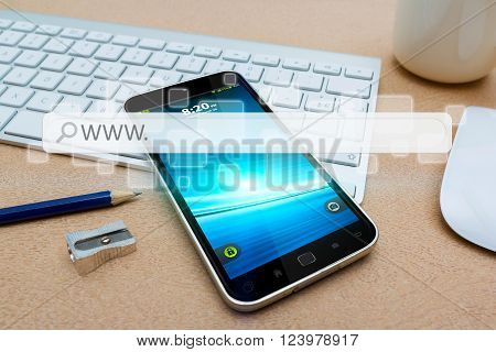 Modern mobile phone in office with web bar flying over