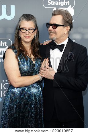 Gisele Schmidt and Gary Oldman at the 23rd Annual Critics' Choice Awards held at the Barker Hangar in Santa Monica, USA on January 11, 2018.