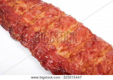 Roasted pork ribs isolated on white background.