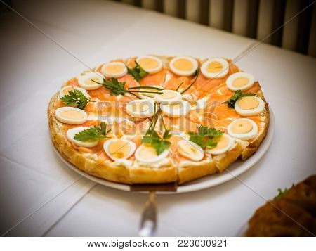 Pattern Arrangement of coffee break snack in complete set ready for participants after meeting, seminar, workshops, conference, catering on white table, deep fried dumping, cake, fruit, grill salmon