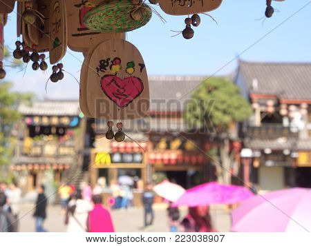Hanging Wooden blessings in Lijiang Old Town. The UNESCO Heritage City. Travel in Lijiang, Yunnan Province, China in 2012, November 17th