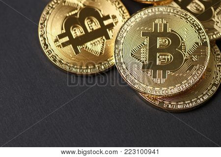 Golden bitcoin with money coins background. Bit coin cryptocurrency banking money transfer business technology