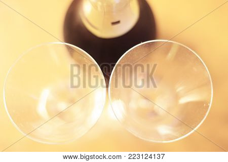 Bottle of shampagne and a pair glasses