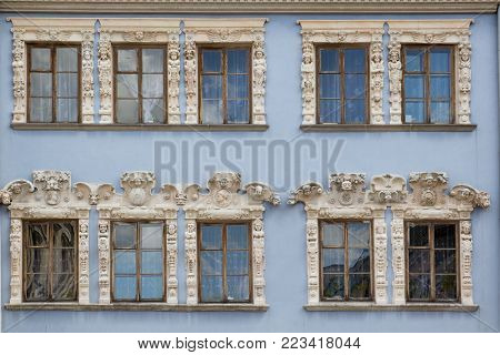 The blue facade of the old vintage houses