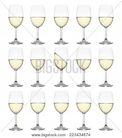 fifteen glass jars with white wine on a white background