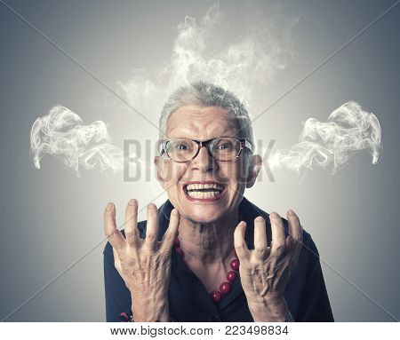 A senior woman can't take it anymore, yelling and giving off steam and smoke