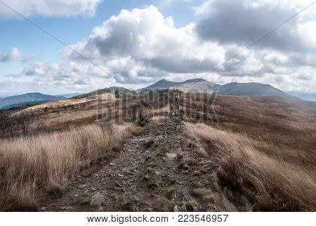 Polonina Wetlinska in Bieszczady mountains in southeastern Poland during nice autumn day with blue sky and clouds