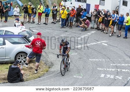 Col du Glandon, France - July 24, 2015: The Colombian cyclist Jarlinson Pantano of IAM Cycling Team,climbing the road to Col du Glandon in Alps, during the stage 19 of Le Tour de France 2015.