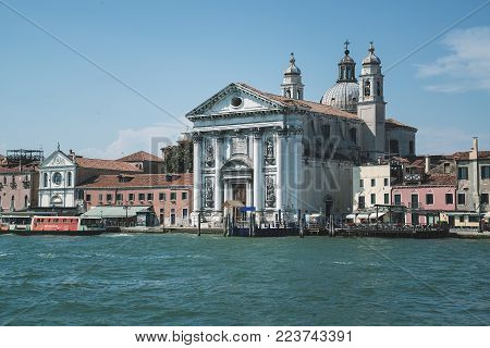 VENICE, ITALY: June 20, 2017: Santa Maria del Rosario is a Dominican church on the Giudecca Canal. Also known as I Gesuati, this classic style building was started in 1725 and consecrated in 1743.