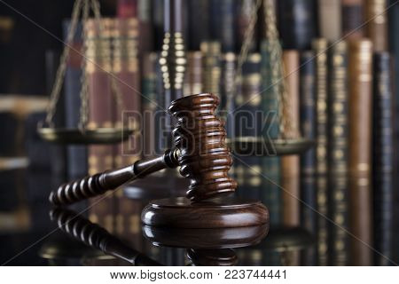Legal system. Law and justice concept. Gavel of the jugde  in the court library.