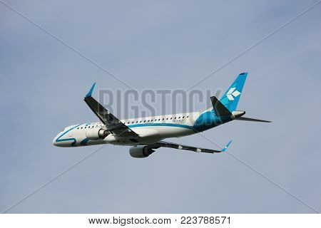 Amsterdam, the Netherlands  -  June 2nd, 2017: I-ADJU Air Dolomiti Embraer ERJ-195LR taking off from Polderbaan Runway Amsterdam Airport Schiphol