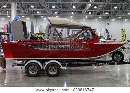 MOSCOW - MARCH 09, 2017: Red Boat Weldcraft Renegade 600 FX for 10 International boat show in Moscow. Russia.