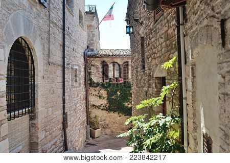 Medieval street in the Italian hill town of Assisi. The traditional italian medieval historic center in Umbria. Italy