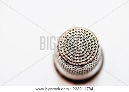 A Metal Thimble. Close-up, Space For Text