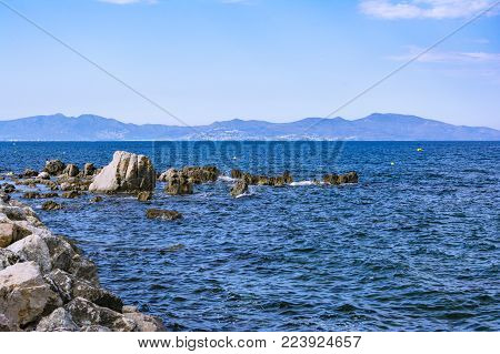 Mediterranean sea coast, Costa Brava and mountains of Cap de Creus from the beautiful town of L'Escala