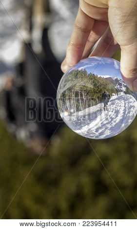 Roc Del Quer trekking trail, reflection view through crystal ball, Principality of Andorra.