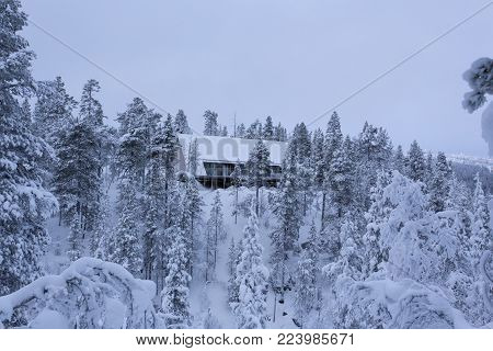 Saariselka, Finaland - December 31, 2017: Aurora observation point seen from the forest