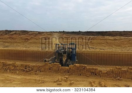 Shell Quarry Quarry. Cutting A Seashell Into Blocks Right Away In A Quarry.