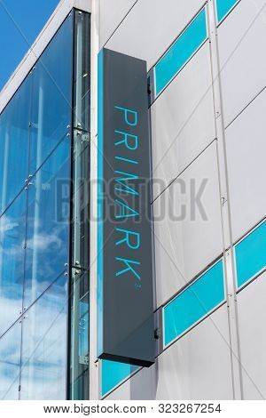 Hannover, Germany - June 8, 2019: Vertical View Of Primark Logo On Shop Facade. Primark Is Fashion R