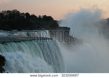 Close up of Niagara falls viewed from usa in twilight, captured as a frozen view of the water