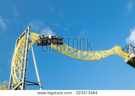 Helsinki, Finland - 14 September 2019: Linnanmaki Amusement Park, Ride Roller Coaster Ukko In Motion