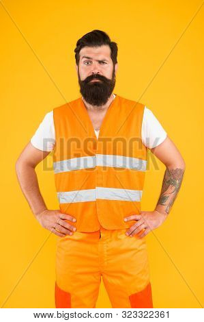 Brutal And Professional. Brutal Caucasian Man With Long Beard On Yellow Background. Brutal Hipster W