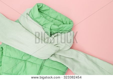 Autumn Flat Lay With Warm Clothing Trend Color On Pink Background. Bright Fashion Clothes For Womans