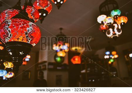 Close Up Of Exotic Lights Hanging In A Local Small Business Restaurant.