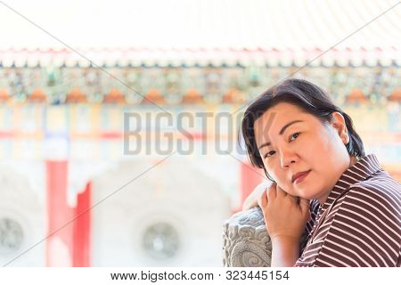 Woman At Wat Boromracha Kanchanapisek Anusorn