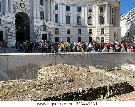 Vienna, Austria - September 21, 2019: Crowds Of Tourists Frequent The Town Square Michalerplatz In C