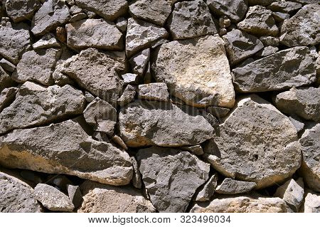 Traditional Dry Volcanic Rock Wall In Puerto Calero, Lanzarote