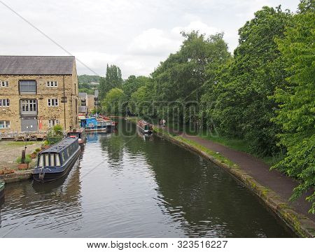 Sowerby Bridge, West Yorkshire, United Kingdom - 14 June 2019: People And Boats Around The Wharf Are