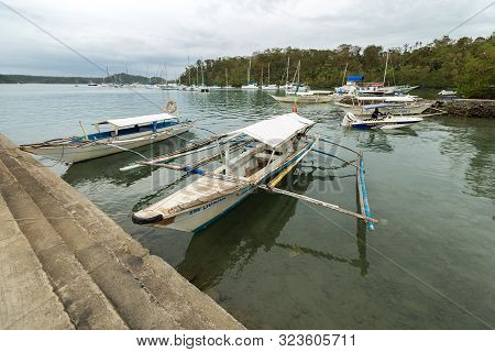 Sabang, Puerto Galera, Philippines - January 9, 2017: Scenery Of A Fishing Boats, With Seascape On B