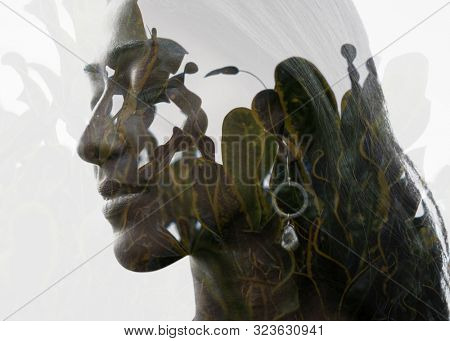 Double exposure profile portrait combined with growing plants. Nature and inner peace