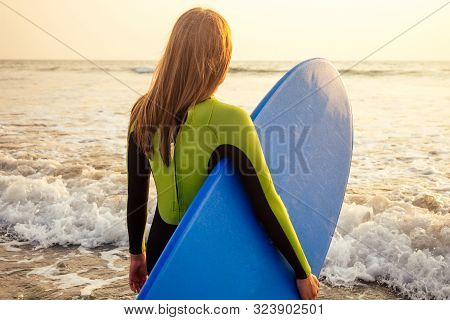 Active Women With Surf Board Enjoy Watersport At Vacation Holidays.sport Girl In Surfing School Inst