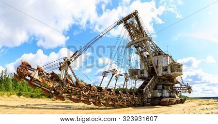 Old Rusty Multi Bucket Excavator, Giant Stacker, Absetzer In Sandy Career.