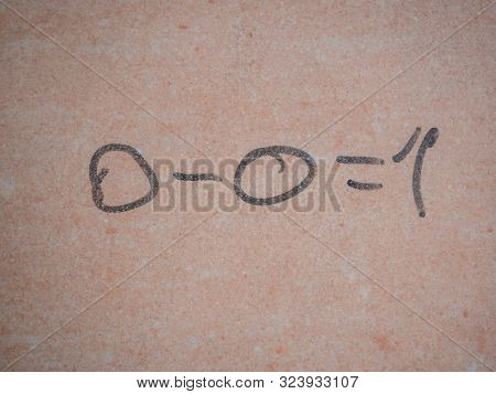 Handwritten In Black Felt-tip Pen Text On Wall. 0 - 0 = 1. Mathematical Equation. Fuzzy Logic. Binar