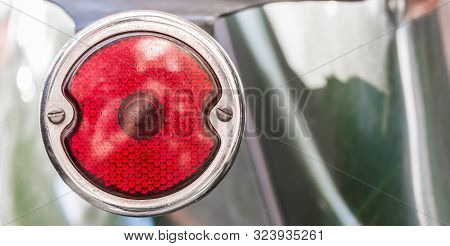 Rear Light Of A Vintage Retro Old Car Automobile Vehicle.