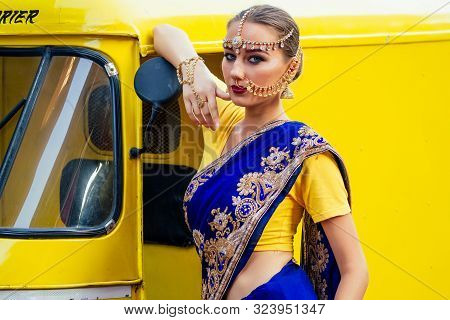 Portrait Indian Beautiful Caucasian Woman In Traditional Blue Dress.hindu Model With Golden Kundan J