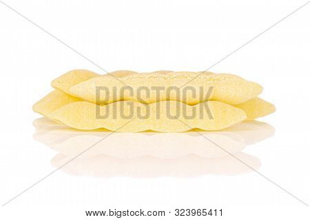 Lot Of Whole Uncooked Pasta Cavatelli Stack Isolated On White Background