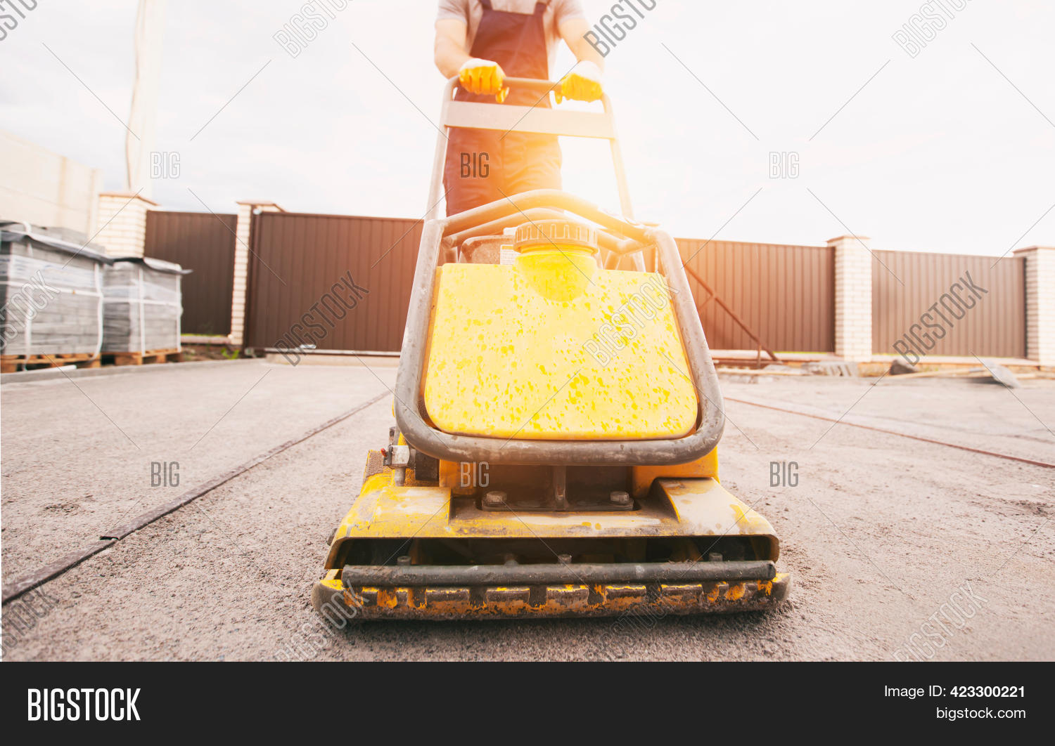 Worker Tamping Gravel Image & Photo (Free Trial) Bigstock