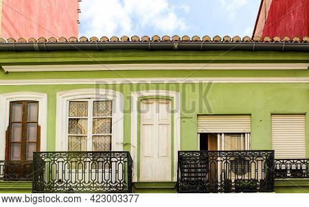 Colorful Facades Of Old Buildings In The Cabanyal Neighborhood In Valencia, Spain